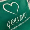 Green grandad full of love care and laughter white writing