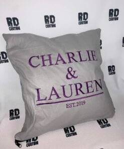 Grey couple cushion purple writing