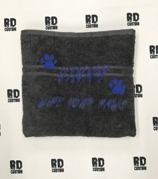 dark grey towel dark blue writing vinny