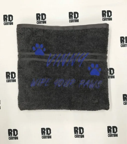 dark grey towel dark blue writing vinny