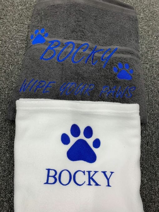 Dark grey towel royal blue writing bocky set