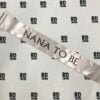 nan to be silver black writing